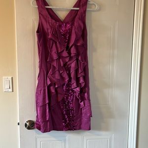 Pinkish colour dress. Satin with ruffles and sequins down middle